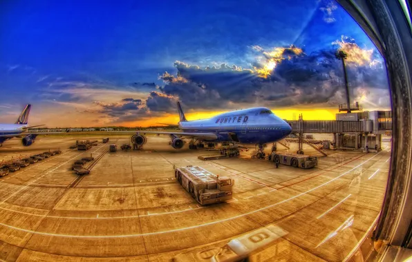 The sky, clouds, aircraft, the window, airport
