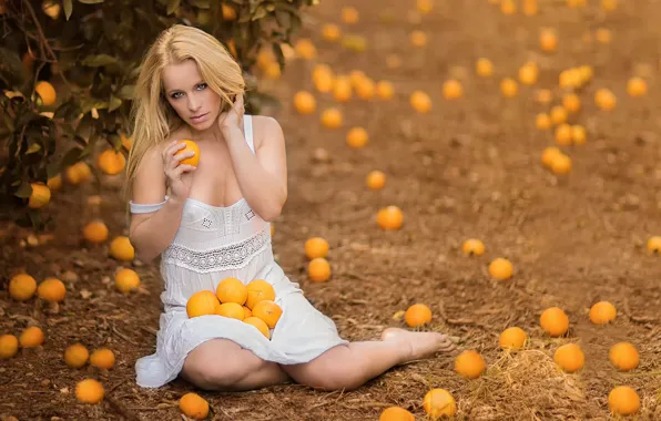 Girl, oranges, vitamins