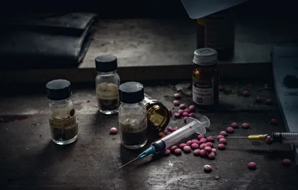 Background, pills, syringe