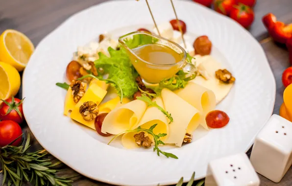 Cheese, honey, nuts, tomato, rosemary, cuts