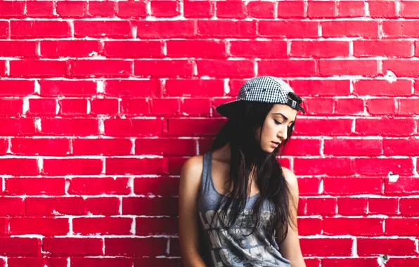 Picture wall, brunette, cap, bricks, baseball cap