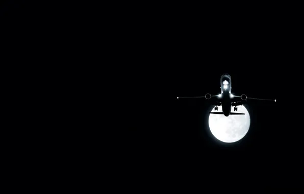 Night, the plane, the moon