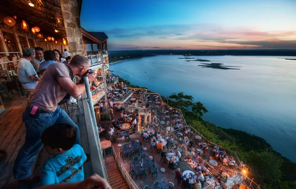 Picture sunset, people, coast, tables, lights, photographer, restaurant