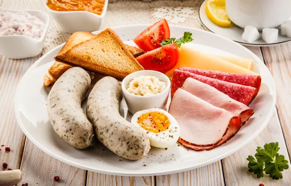 Egg, plate, tomatoes, sausage, ham