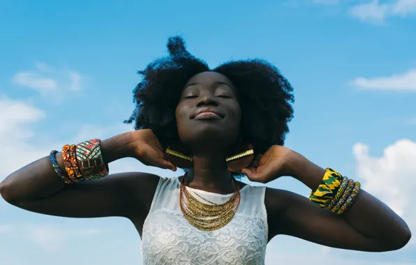 The sky, clouds, decoration, smile, positive, earrings, bracelets, gesture