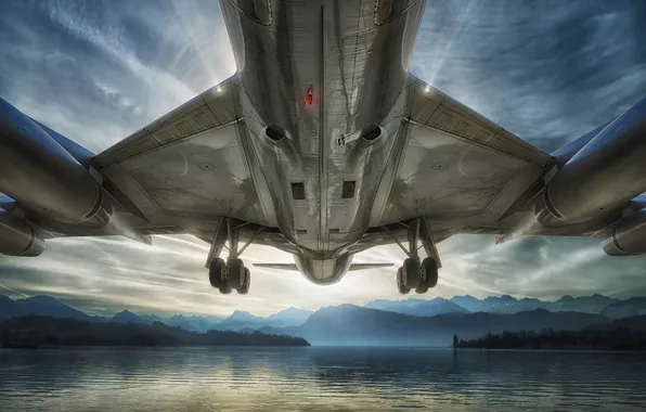 The sky, water, mountains, the plane, chassis