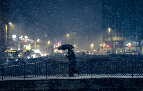 Snow, bridge, lights, people, umbrella, bus