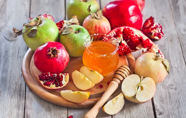 Apples, grain, honey, slices, garnet, dry leaves
