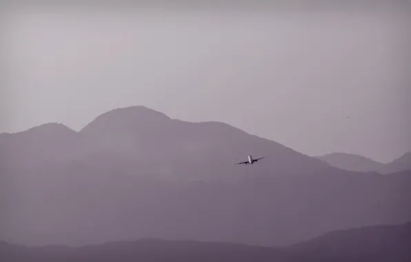 Picture the sky, mountains, the plane