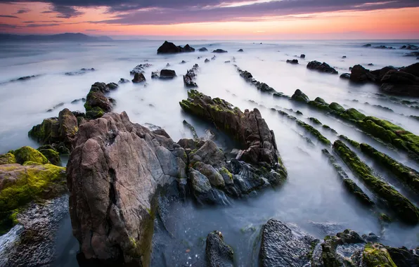 Sea, sunset, stones, ridge