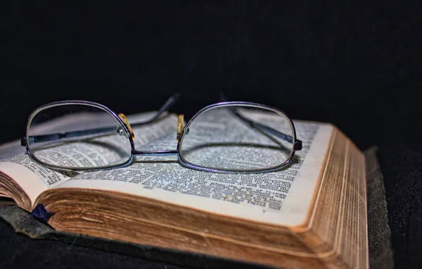 Glasses, book, black background, old