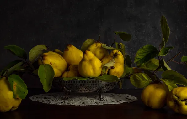 Leaves, branches, the dark background, table, yellow, harvest, fruit, still life