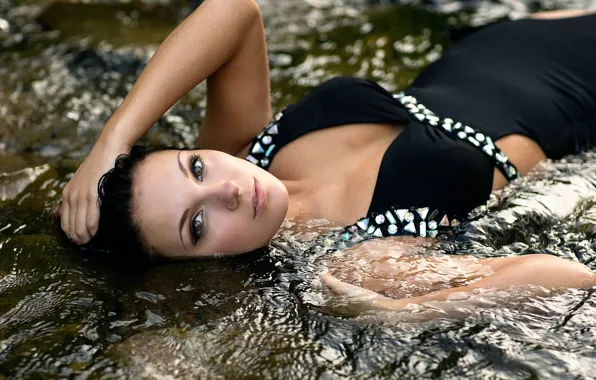 Picture piercing, in the water, brown eyed girl