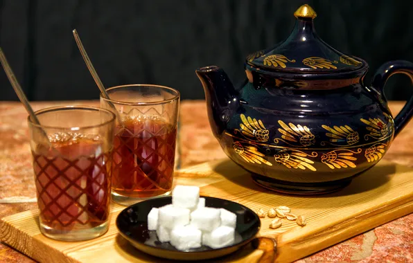 Tea, kettle, sugar, glasses