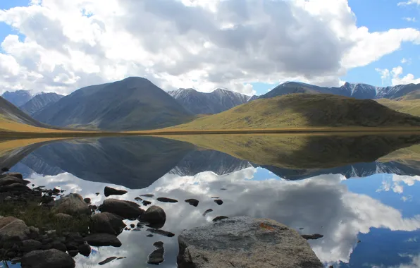 The sky, clouds, mountains, yellow, lake, reflection, calm, glass