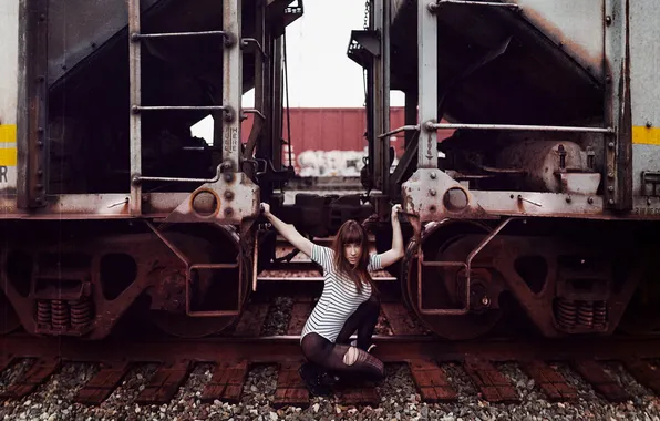 Girl, cars, railroad