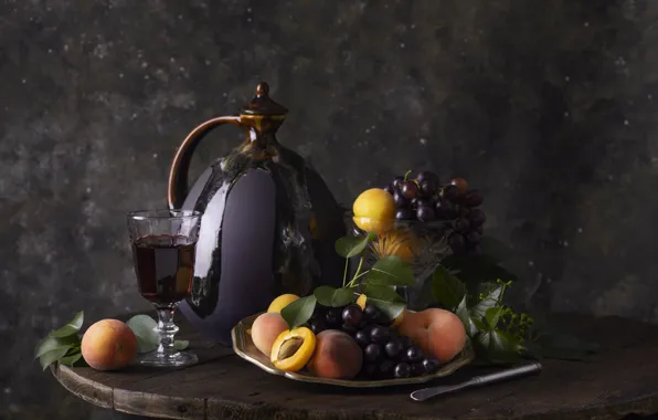 Leaves, the dark background, table, wine, glass, kettle, grapes, knife