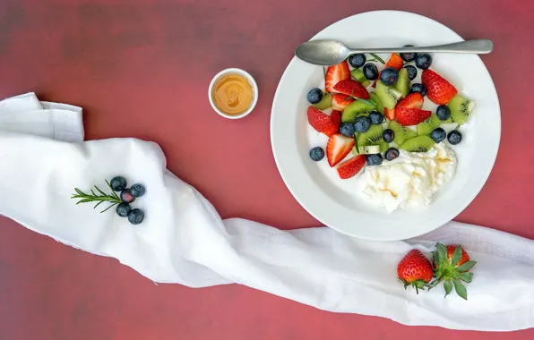 Berries, towel, kiwi, blueberries, cream, strawberry, plate, spoon