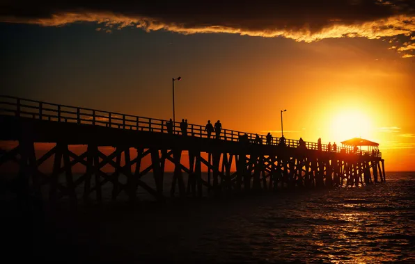 Sea, the sky, clouds, sunset, shore, people, silhouette, pierce