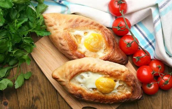 Picture greens, eggs, tomatoes, khachapuri