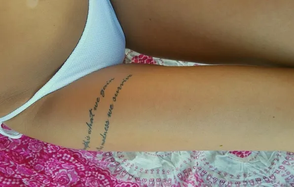 Panties, slender legs, tattoo on the leg