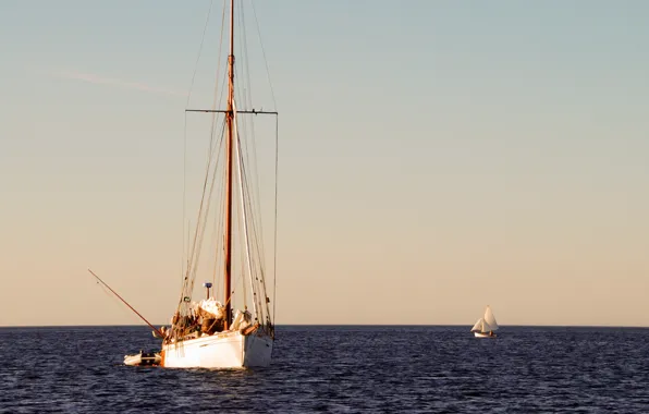 The ocean, calm, fishermen, at anchor, yacht Storm Bay, yacht Stormy bay