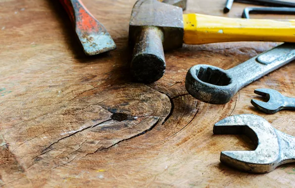 Table, hammer, wrench, hand tools