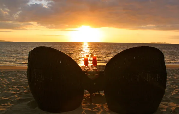 Sunset, the ocean, the evening, chairs, table