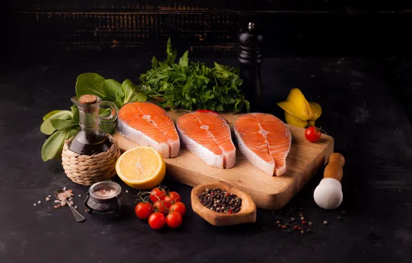 Greens, lemon, fish, red, tomatoes, spices, bottle, cutting Board