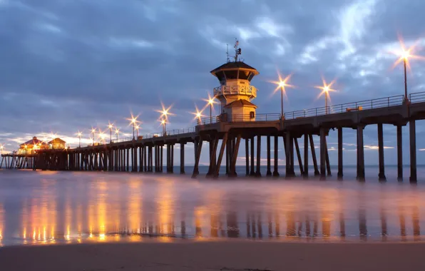 Picture sea, the sky, clouds, lights, shore, tower, the evening, pierce