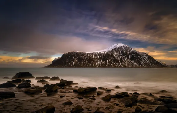 Winter, sea, the sky, mountains, stones, rocks, coast, the evening