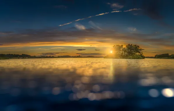The sky, the sun, clouds, lake, island