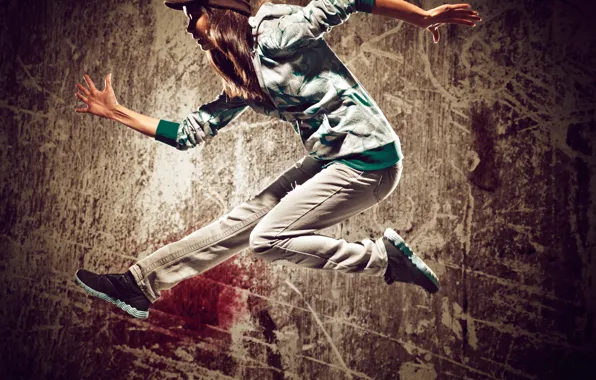 Girl, pose, wall, jump, sneakers, dance, jeans, hairstyle