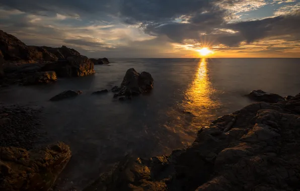 Sea, clouds, rays, sunset, pebbles, stones, rocks, shore