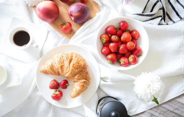 Coffee, strawberry, nectarine, croissant