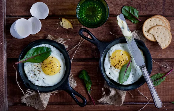 Greens, scrambled eggs, crackers