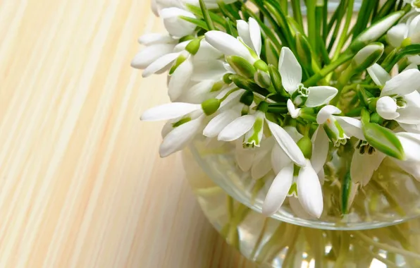 Vase with flowers, on the table, standing