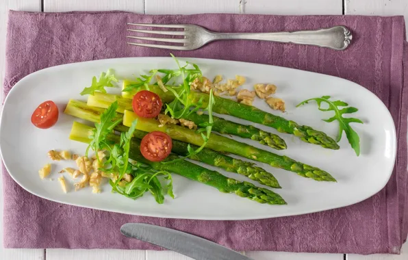 Nuts, vegetables, tomatoes, asparagus, arugula