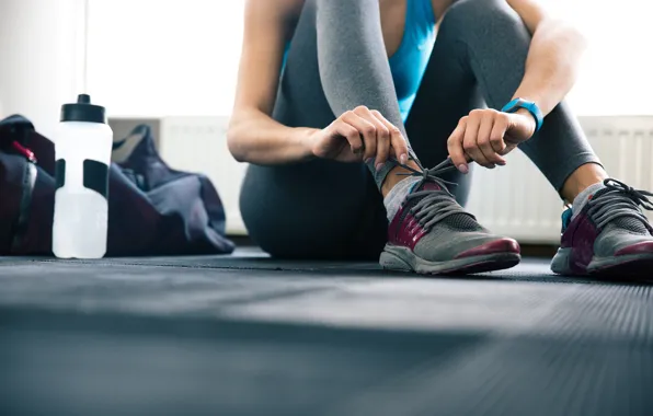 Picture tie, sneakers, laces, water bottle, preparations