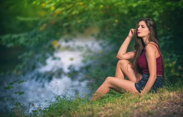 Girl, river, bokeh, on the shore