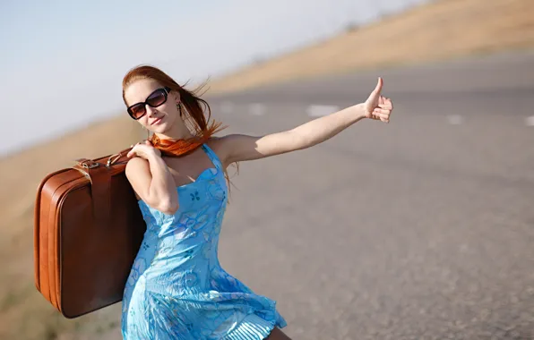 Picture girl, dress, highway, glasses, suitcase, is, gesture, redhead