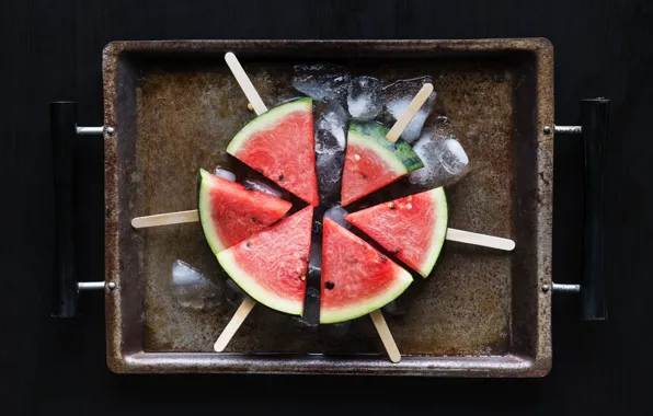 Ice, sticks, watermelon, pieces, black background, slices, tray