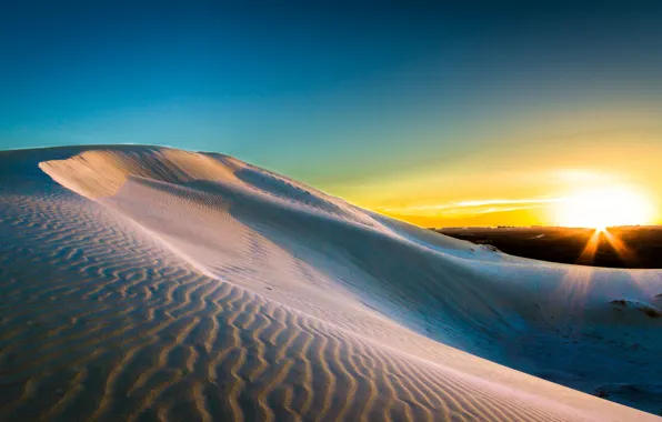 Sand, the sun, dawn, dunes