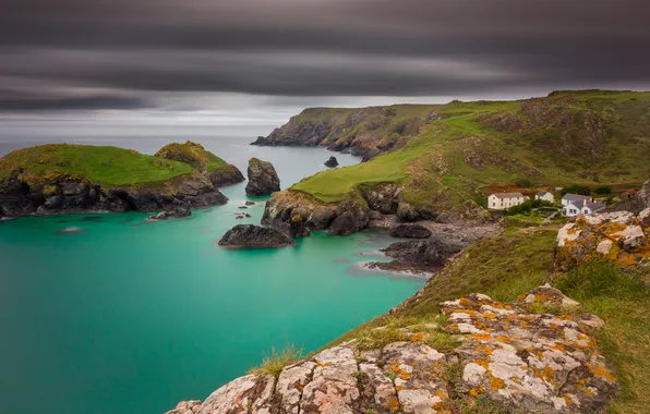 The sky, mountains, clouds, stones, rocks, shore, house, pond