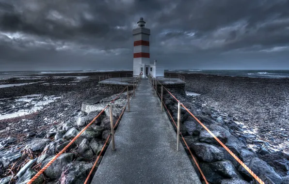 Sea, shore, lighthouse