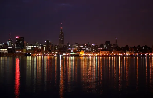 Sea, lights, night city