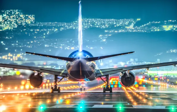 The city, lights, the plane, runway