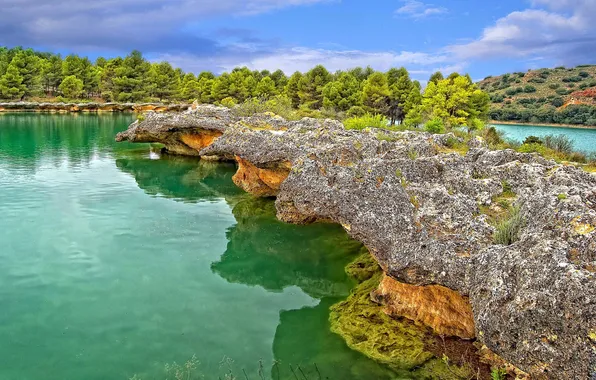 The sky, trees, rock, lake, river, hills