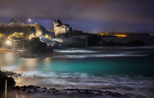 Sea, night, lights, castle, rocks, shore, home, mansion