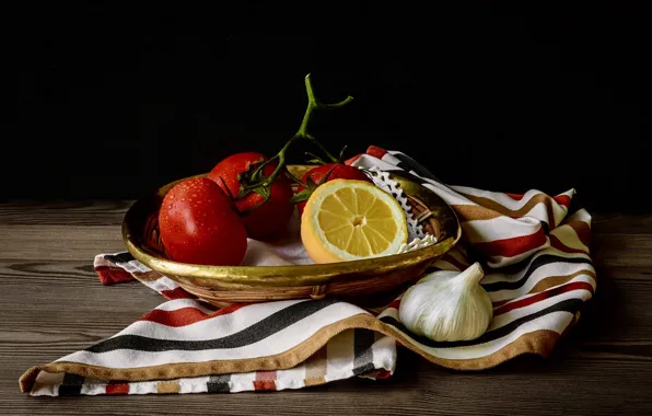 Lemon, towel, plate, black background, still life, tomatoes, garlic